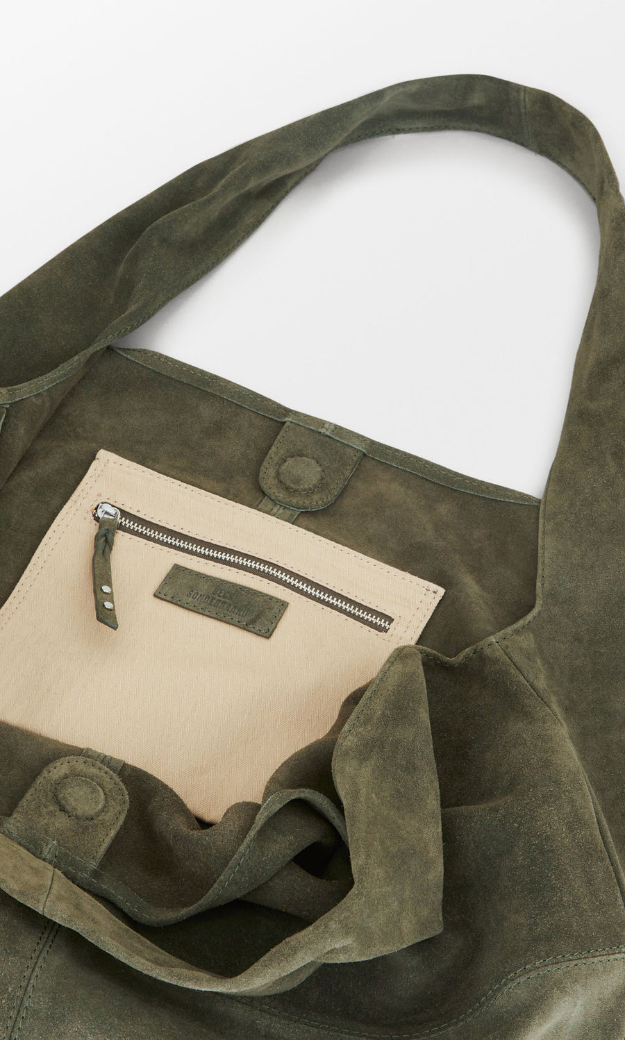 Plümo  Olivia Suede Bag: Olive green, beige zippered pocket, magnetic closure—your go-to stylish, slouchy shoulder bag.
