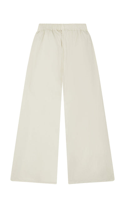 Plümo- Jung Pants—hand-dyed, wide-leg cream cotton with a high waist and elastic band, shown on a white background.