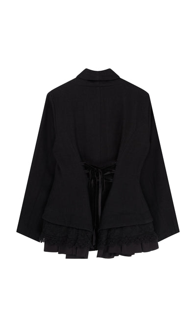 Plümo- Cara Riding Jacket: vintage-inspired black peplum with lace-up back and ruffled hem, shown from the back.
