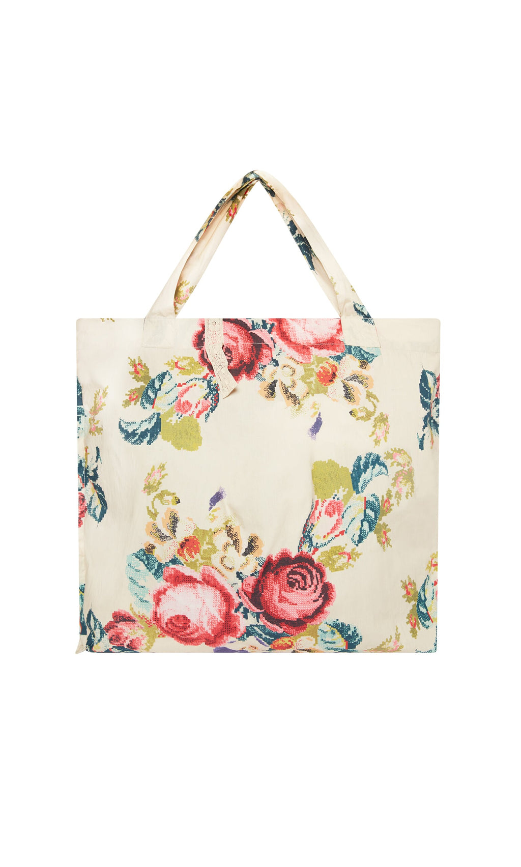 Plümo- Carrie Flower Bag: Lightweight cotton tote with short handles and a cross-stitch print of pink, green, and blue flowers.