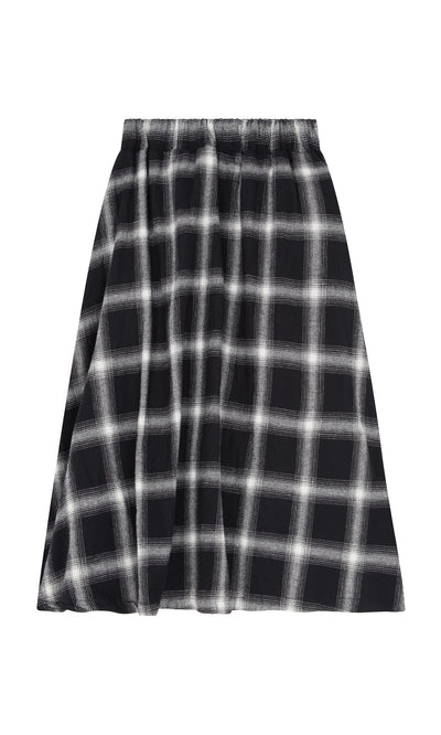 Plümo- Noemi Skirt: black and white plaid flannel A-line skirt with elastic waistband, shown on white background.