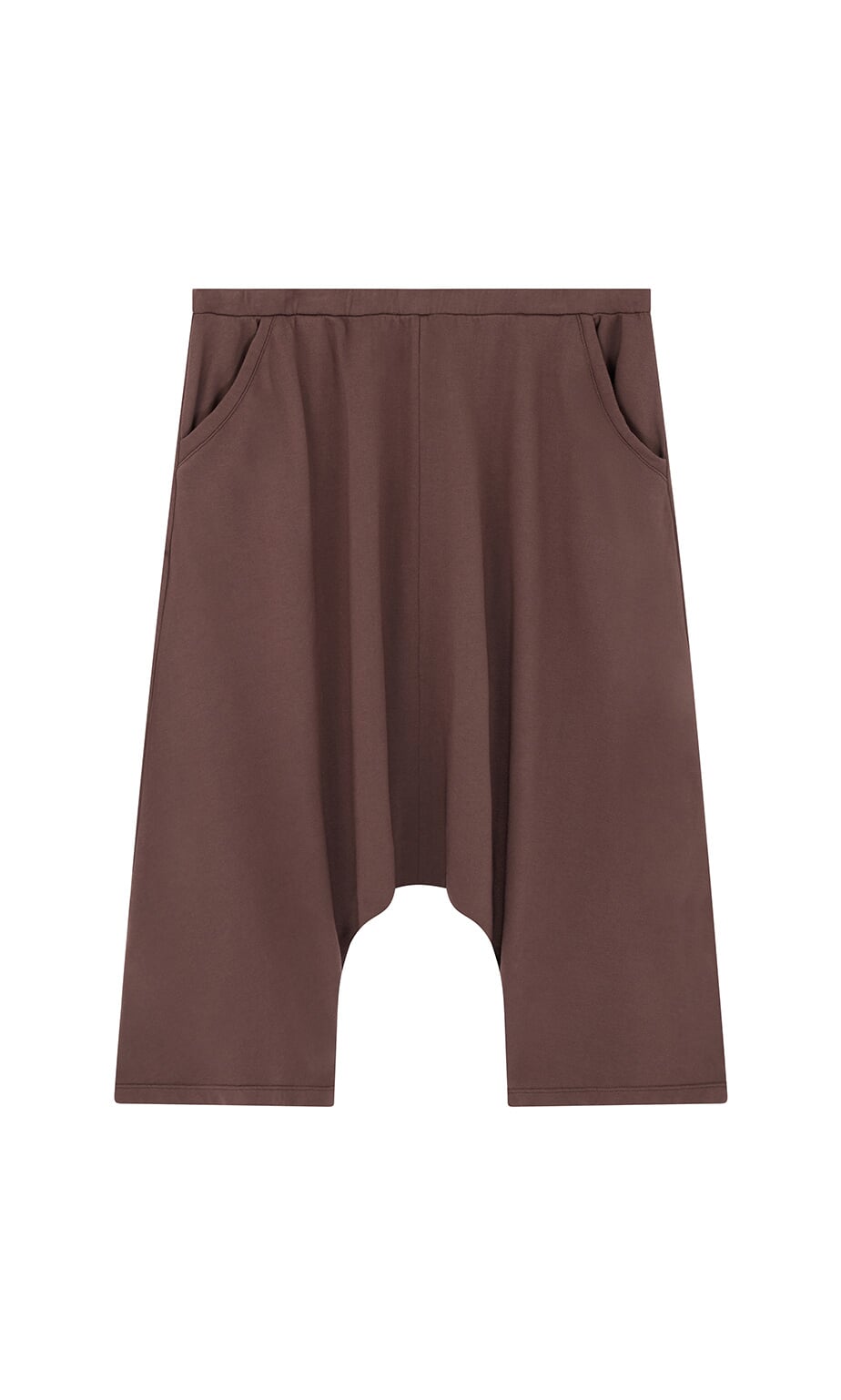 Plümo- Sybel Pants: brown knee-length jersey with wide legs, side pockets, and dropped-crotch on a white background.