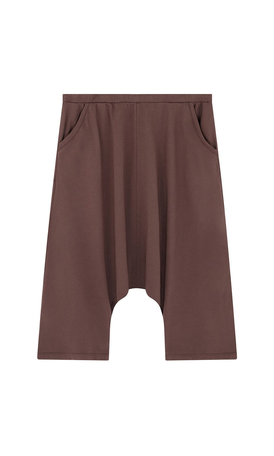Plümo- Sybel Pants: brown knee-length jersey with wide legs, side pockets, and dropped-crotch on a white background.