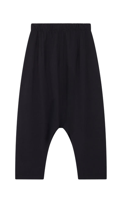 Plümo- Nerula Pants: black, dropped-crotch jersey pants with elastic waistband, shown flat on a white background.