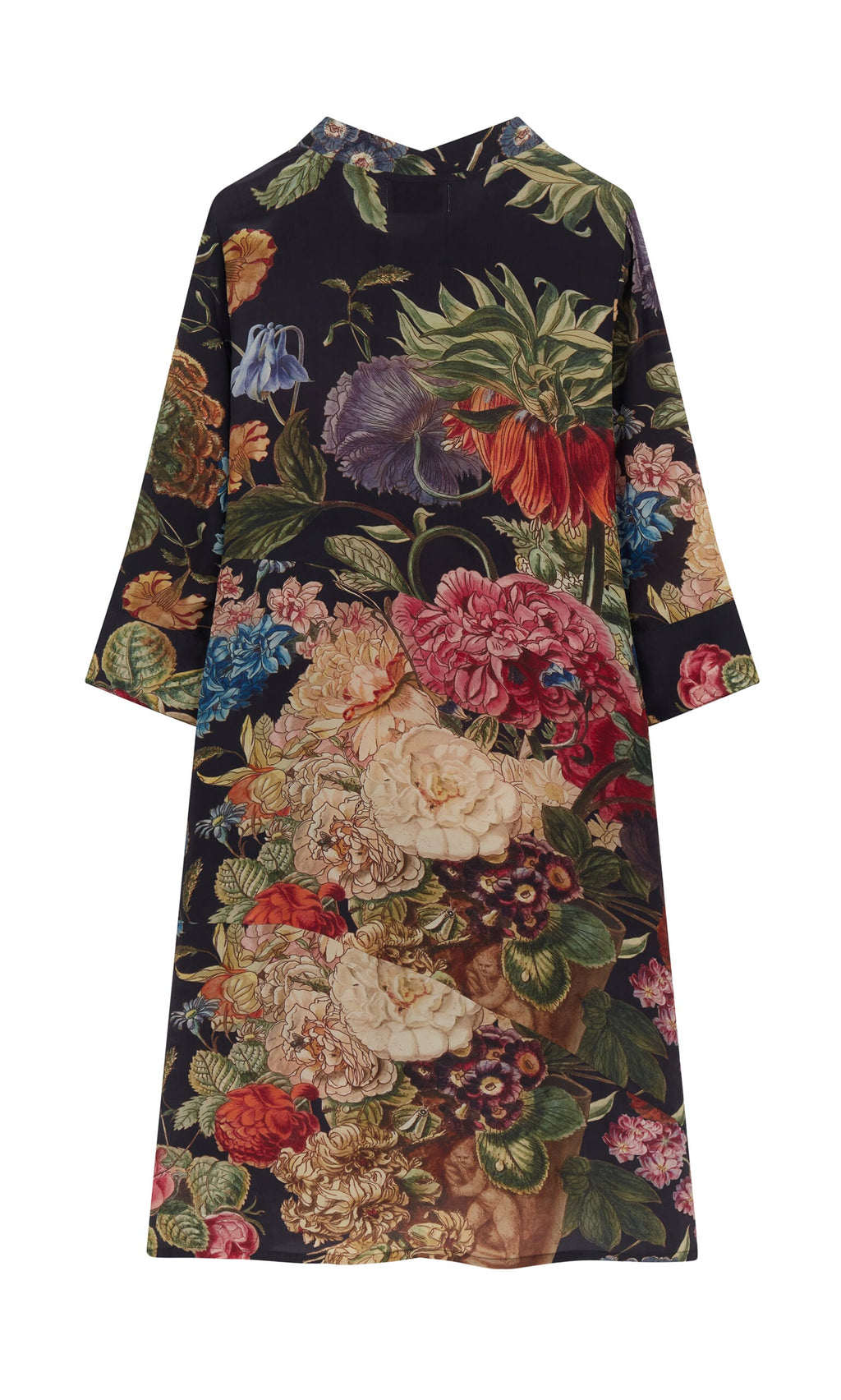 Plümo The Primula Dress is a long-sleeve crepe dress with a vibrant multicolored floral print on a dark background.
