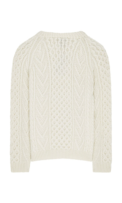 Plümo- Cream-colored Berg Aran Sweater with textured Celtic cable knit pattern, shown from the back.