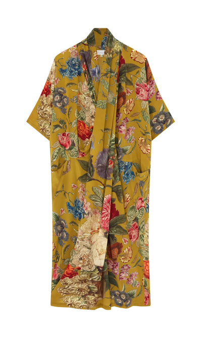 Plümo- Amber Twist Dress in cupro viscose crepe features short sleeves and a vibrant yellow botanical print.