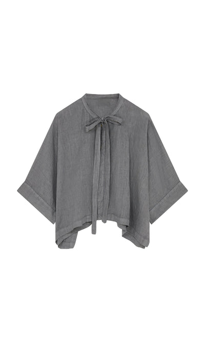 Plümo- The Antoine Blouse - Grey features wide sleeves, a ribbon necktie, and a loose fit in anthracite linen.