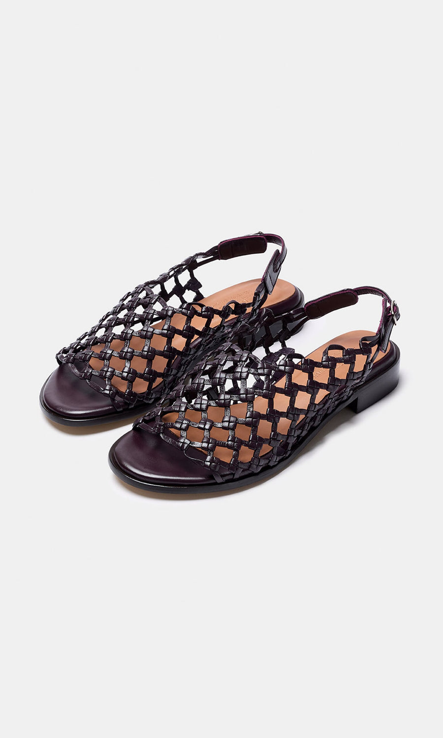 Plümo- Arts Club Sandals: Black woven leather sling-back sandals with open toes, low heels, handcrafted in Spain.