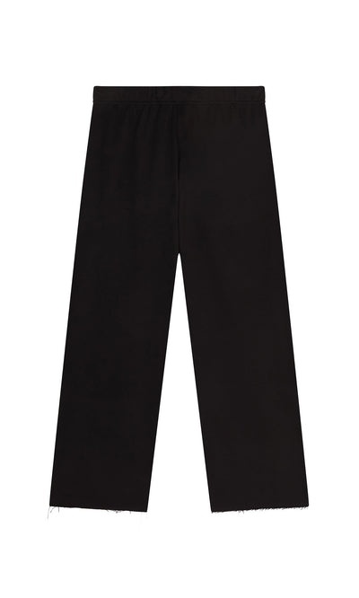 Plümo - Gabriella Pants: black wide-leg cotton jersey trousers with an elastic drawstring waist and raw hems, shown on white.