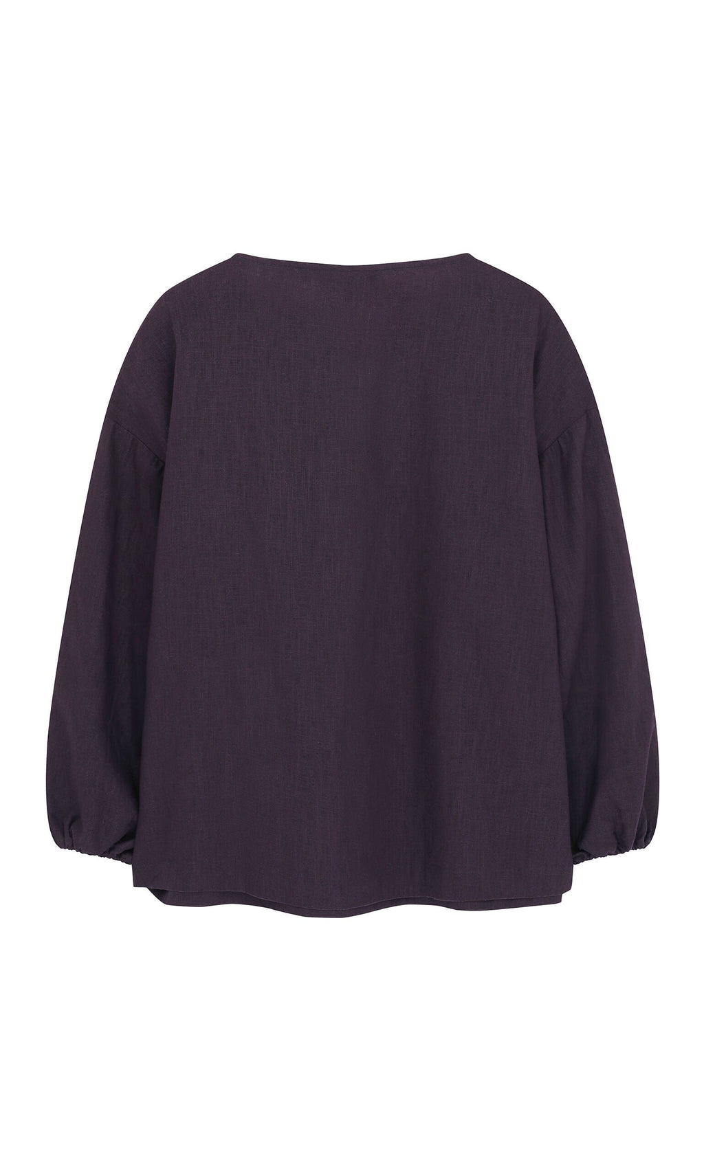 Plümo- Eva Indigo Blouse - Seconds: dark purple boxy blouse with gathered cuffs, straight hem, and subtle ruching, back view.