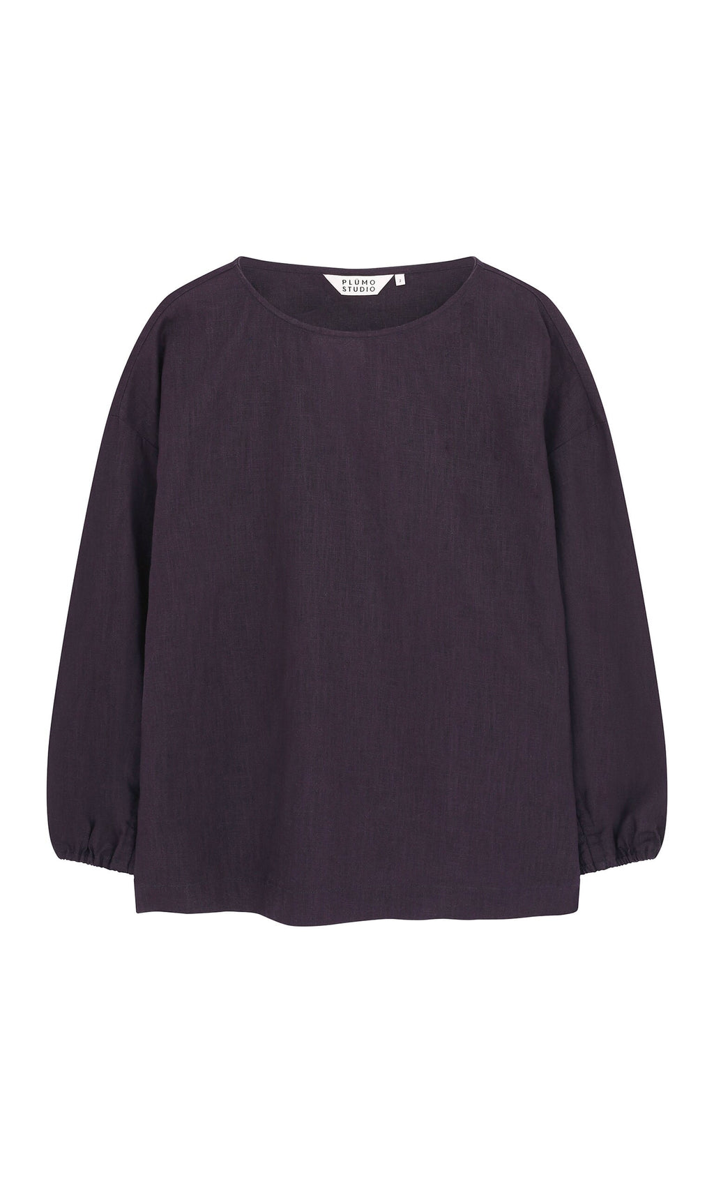 Plümo- Eva Indigo Blouse - Seconds: long-sleeve, boxy dark purple top with gathered cuffs and round neckline on white background.