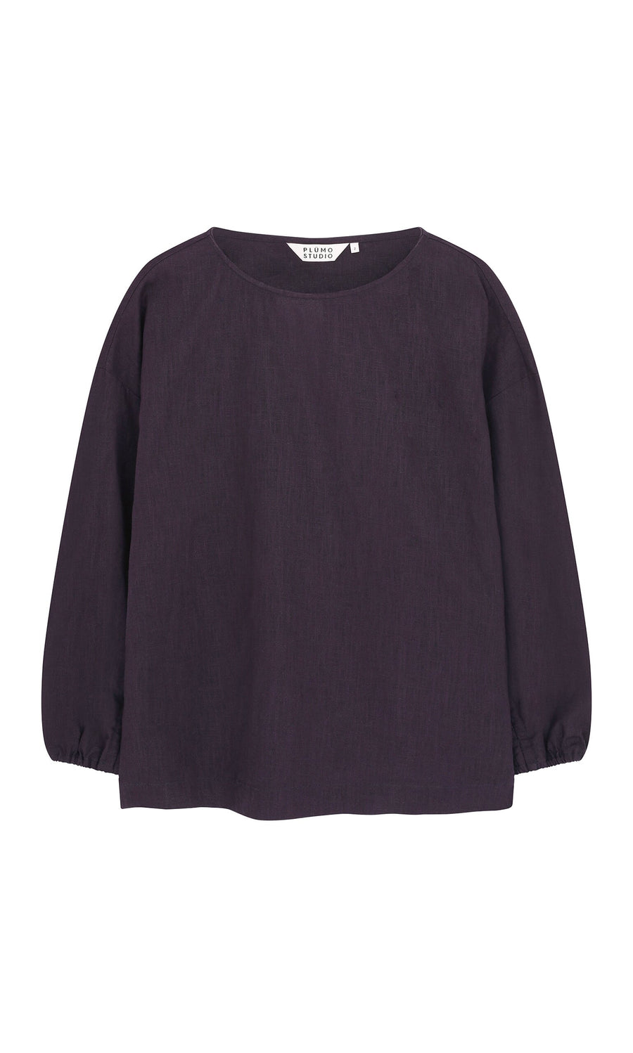 Plümo- Eva Indigo Blouse - Seconds: long-sleeve, boxy dark purple top with gathered cuffs and round neckline on white background.