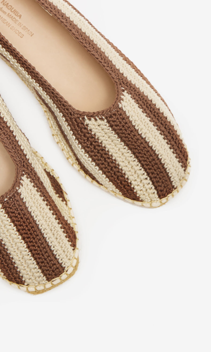 Plümo- Close-up of Basque Espadrilles with stripey design, cushioned insoles, and rounded toes on a white background.