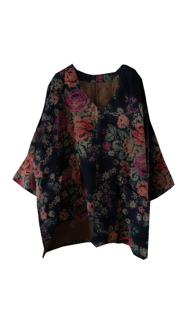 Plümo- Loose, bohemian Liu Pocket Blouse in deep navy with wide sleeves, V-neck, and pink-green floral patterns.