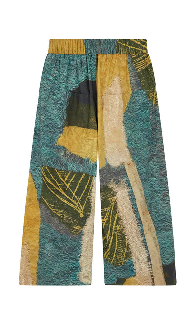 Plümo- Brushstroke Pants: Wide-leg pants with abstract teal and gold leaf patchwork, elastic drawstring waist.