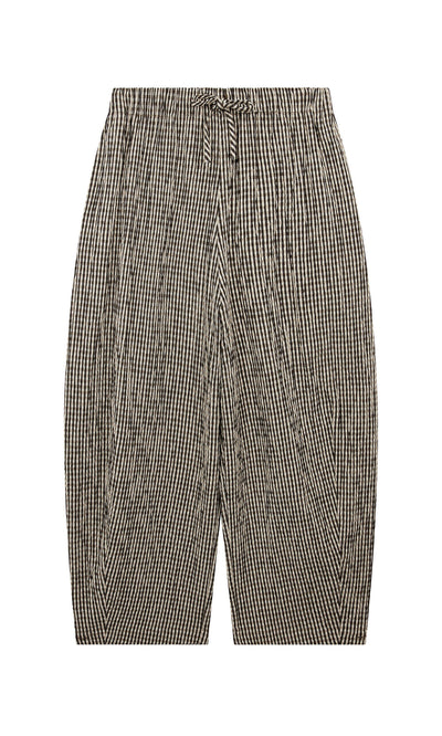 Plümo- Butoni Pants - Gingham: black and white barrel leg pants with elastic waistband and drawstring, laid flat.