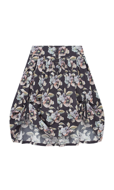 Plümo  The Pugh Flower Skirt is a pleated midi with buttons, featuring pastel florals on a dark base for timeless charm.