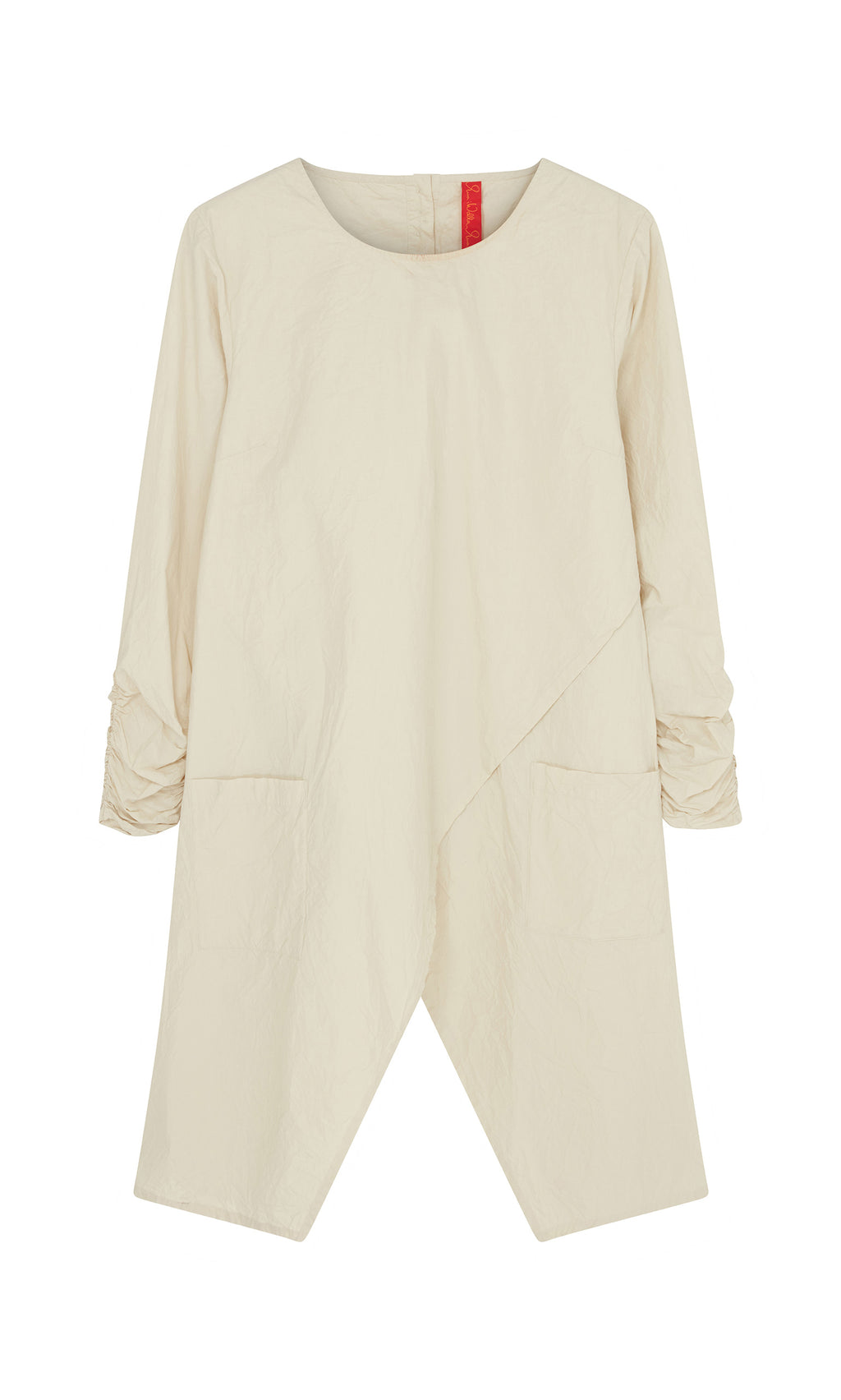 Plümo  Clementine Blouse: Cream, long-sleeved Swedish tunic with asymmetrical hem, ruched sleeves, and front pockets.