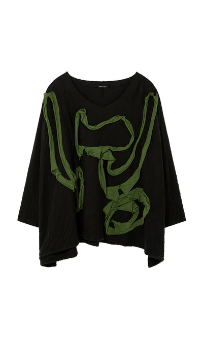 Plümo  Isaac Top: Black loose-fit top with slash neckline and asymmetrical green abstract design on the front.