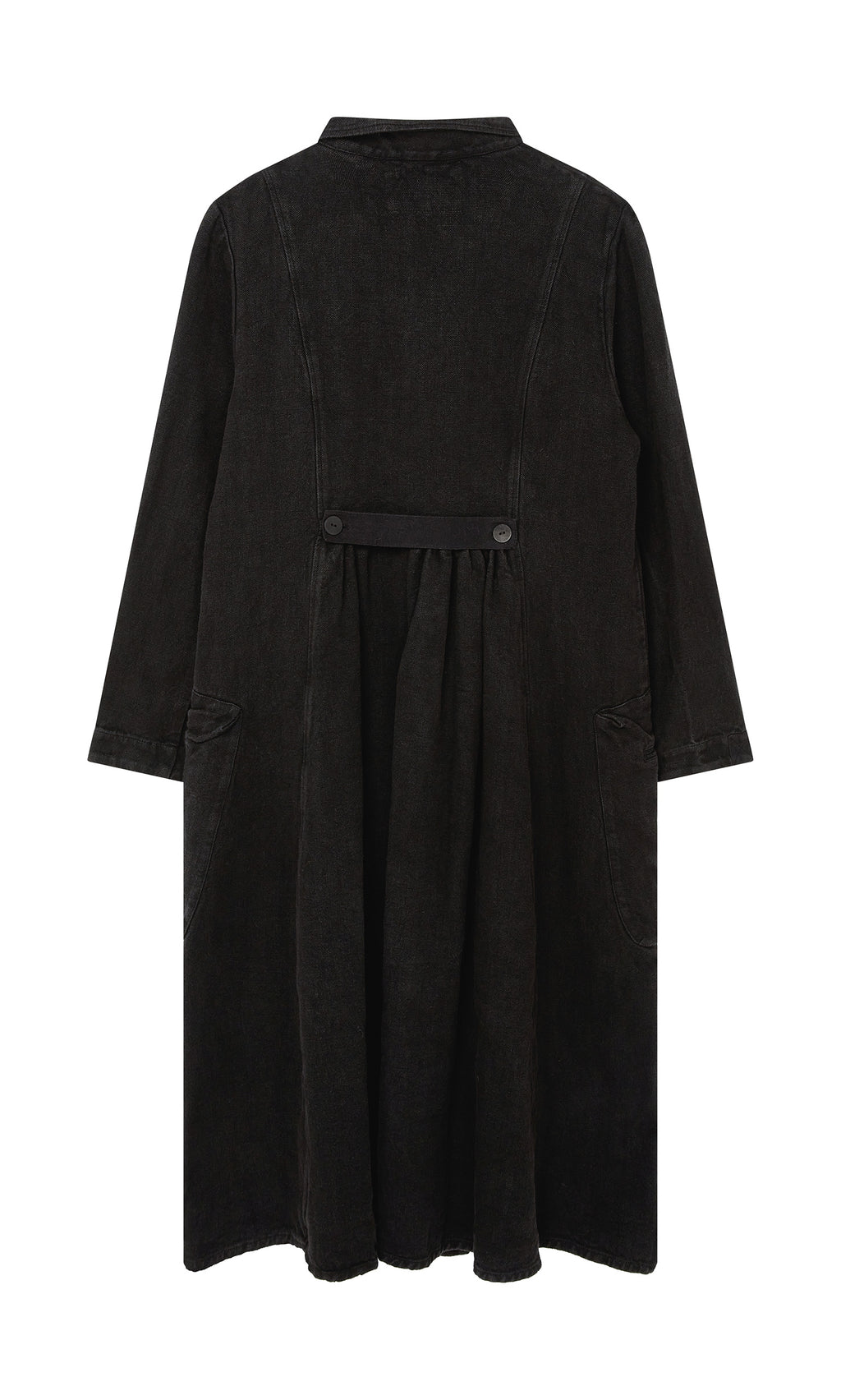 Plümo  The Fowey Coat: a long black corduroy vintage-style coat with front pockets and buttoned waist, shown from the back.