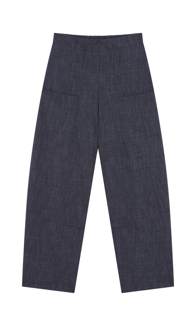 Plümo  Stanner Pants: wide-leg indigo denim with comfy fit, shown flat on white to display front and straight cut.