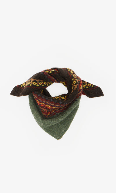 Plümo  The Lenie Necktie, a green Fairisle wool scarf folded in a triangle, channels the spirit of the Scottish Borders.