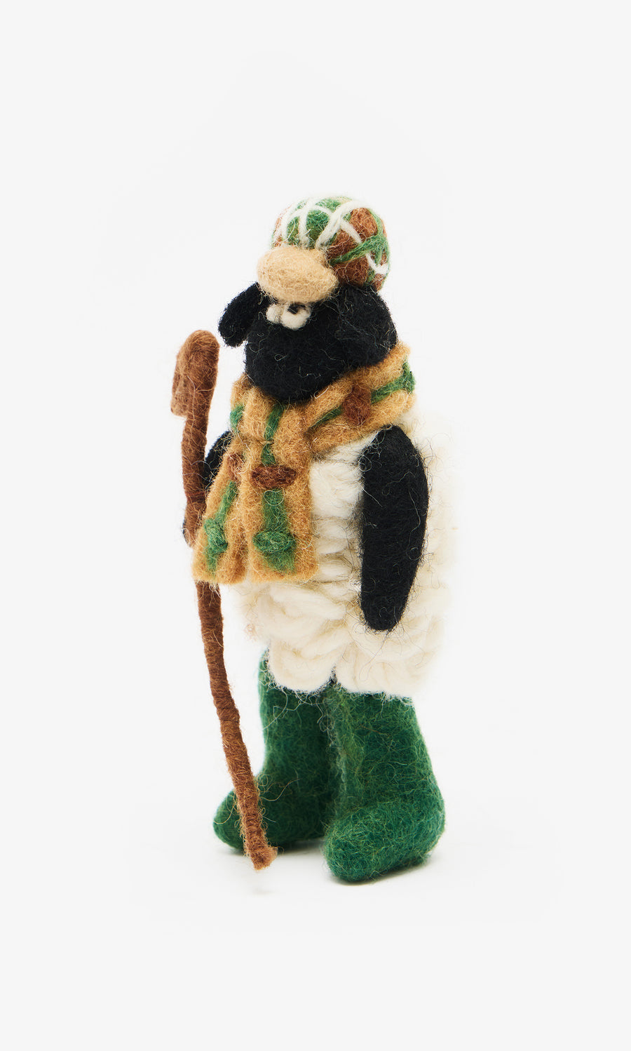 Plümo  Flat Cap Sheep: Handfelted wool sheep in a flat cap, handcrafted in Nepal, holding a brown walking stick.
