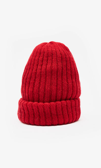 Plümo  Red Breton Beanie crafted from waterproof wool with a thick brim, shown on a plain white background.