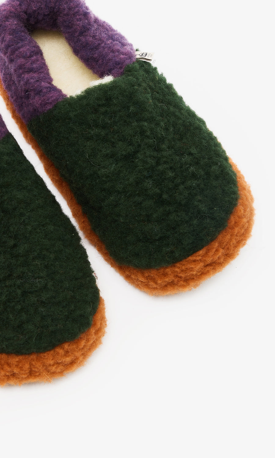 Plümo  Pair of Wool Slippers - Violet with green tops, orange non-slip soles, and purple cuffs on a white background.