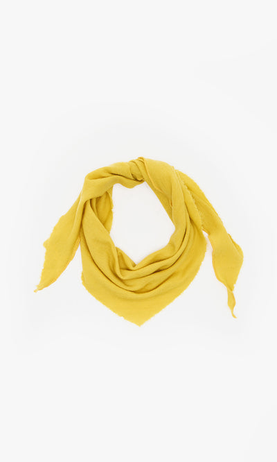 Plümo  Norma Necktie in yellow wool, folded circularly on white, featuring Danish-inspired design elements.