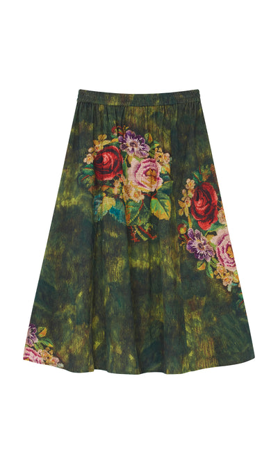 Plümo  The Verity Skirt: a green cotton needlecord with red, pink, and purple florals and a comfy elastic waistband.