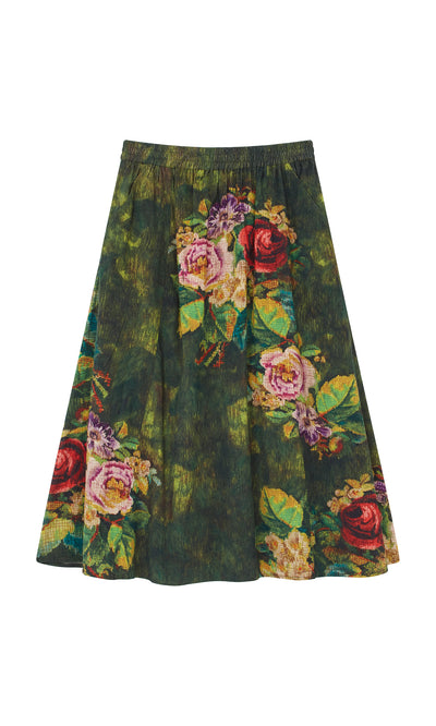 Plümo  Verity Skirt: Green cotton with vibrant rose and leaf print, crafted in soft needlecord for stylish comfort.