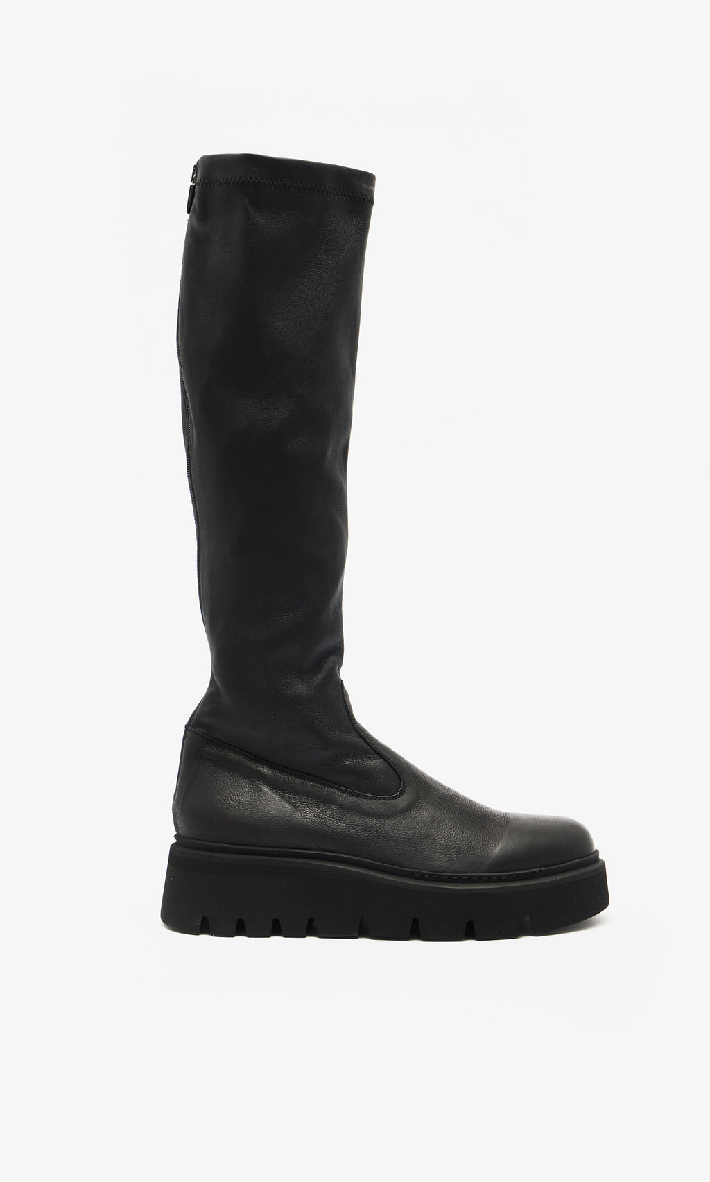 Plümo  Long Prato Boots—sustainable black knee-length pair with chunky ridged soles, pictured in profile on white.