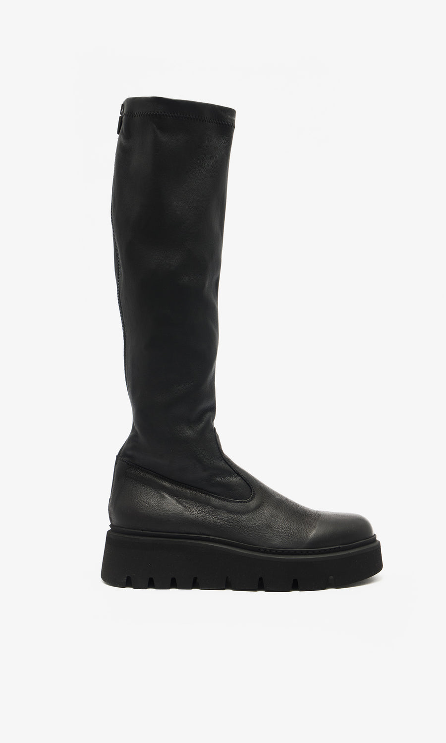 Plümo  Long Prato Boots—sustainable black knee-length pair with chunky ridged soles, pictured in profile on white.