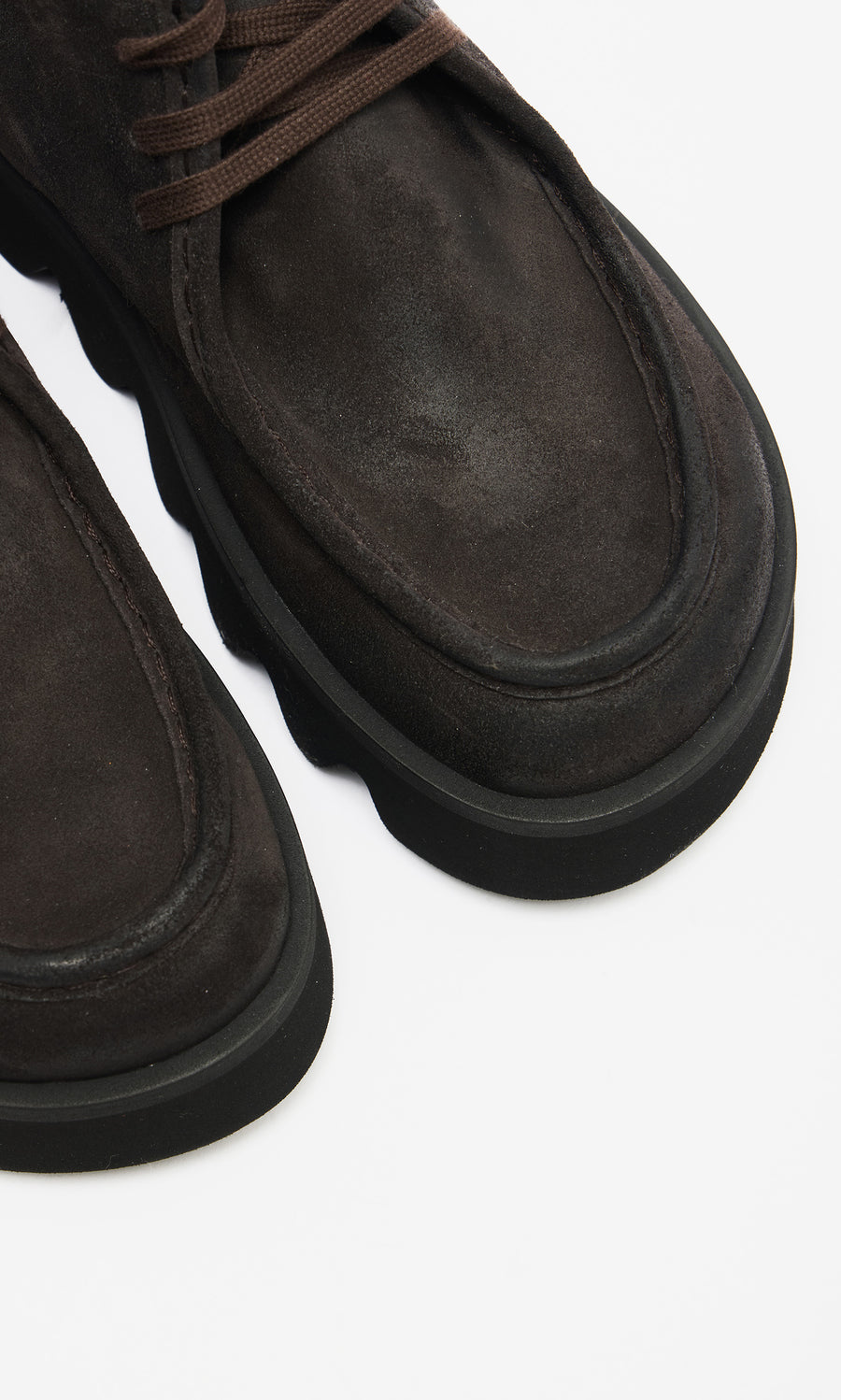 Plümo  Close-up of Rolla Boots in mocha suede with thick black platform soles on a white background.