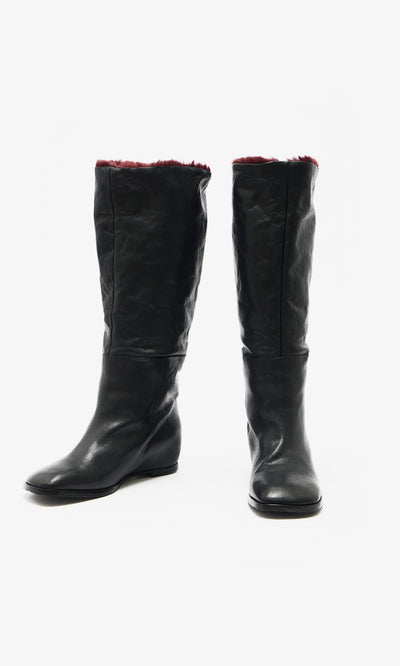 Plümo  Briony Boots: knee-high black leather with hidden wedge  burgundy faux fur lining on a white background.