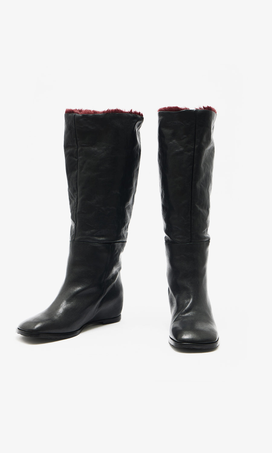 Plümo  Briony Boots: knee-high black leather with hidden wedge  burgundy faux fur lining on a white background.