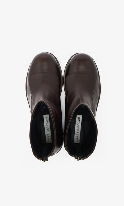 Plümo  Over Boots: Italian-made military gaiter leather ankle boots viewed from above on a white background.
