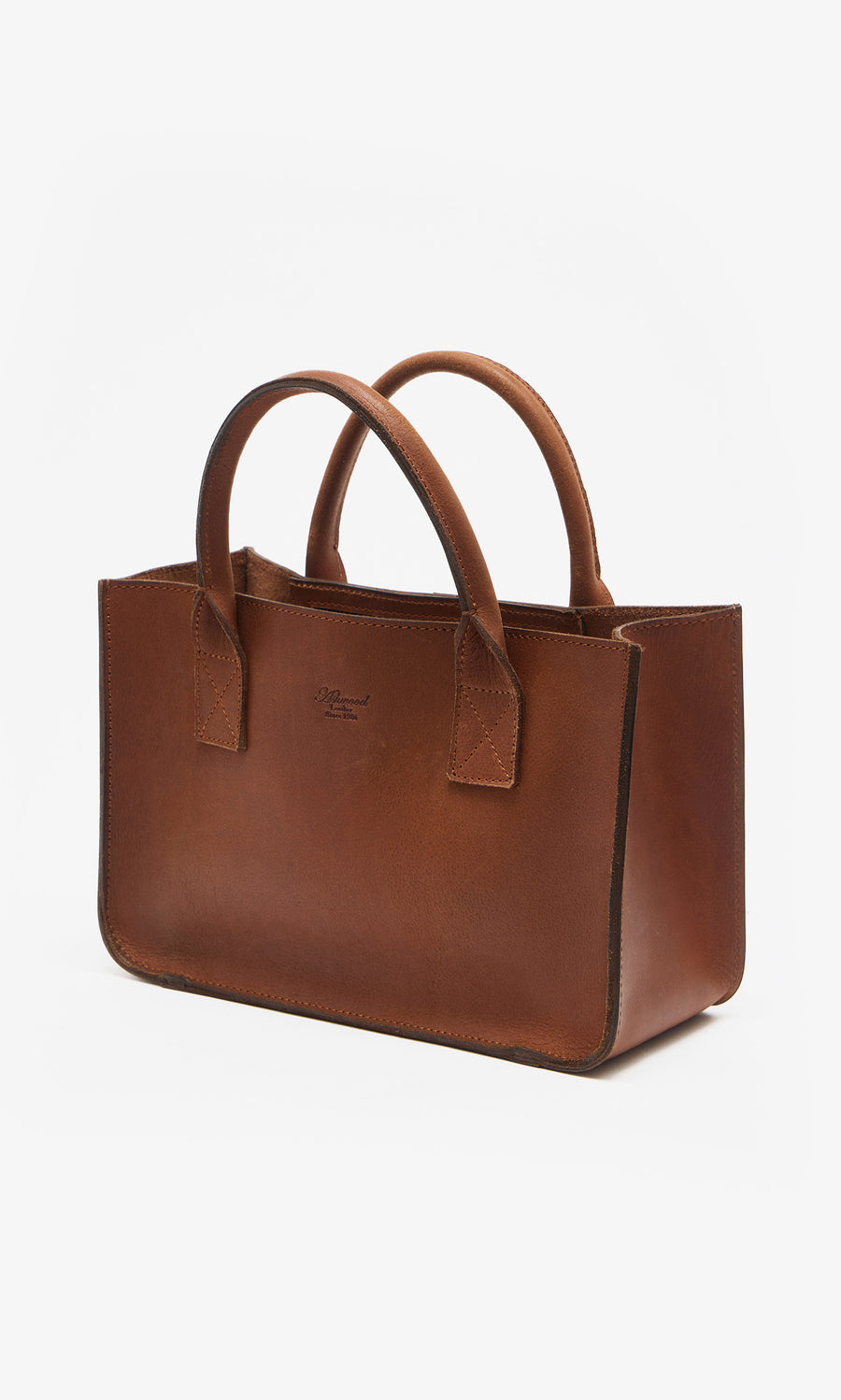 Plümo  The Toni Bag: a brown leather tote with double handles, blending structure and classic British-inspired elegance.