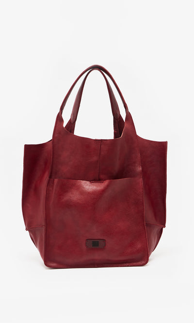 Plümo  Miller Bag - Burnt Sienna: Large leather tote with front pocket, double straps, and a rectangular logo patch.