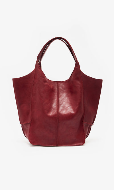 Plümo  Miller Bag - Burnt Sienna: spacious leather hobo with wide straps and a soft, slouchy shape on white background.