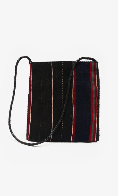Plümo  Medina Bag: Square black Moroccan crossbody with red, green, white, navy stripes and a braided strap.