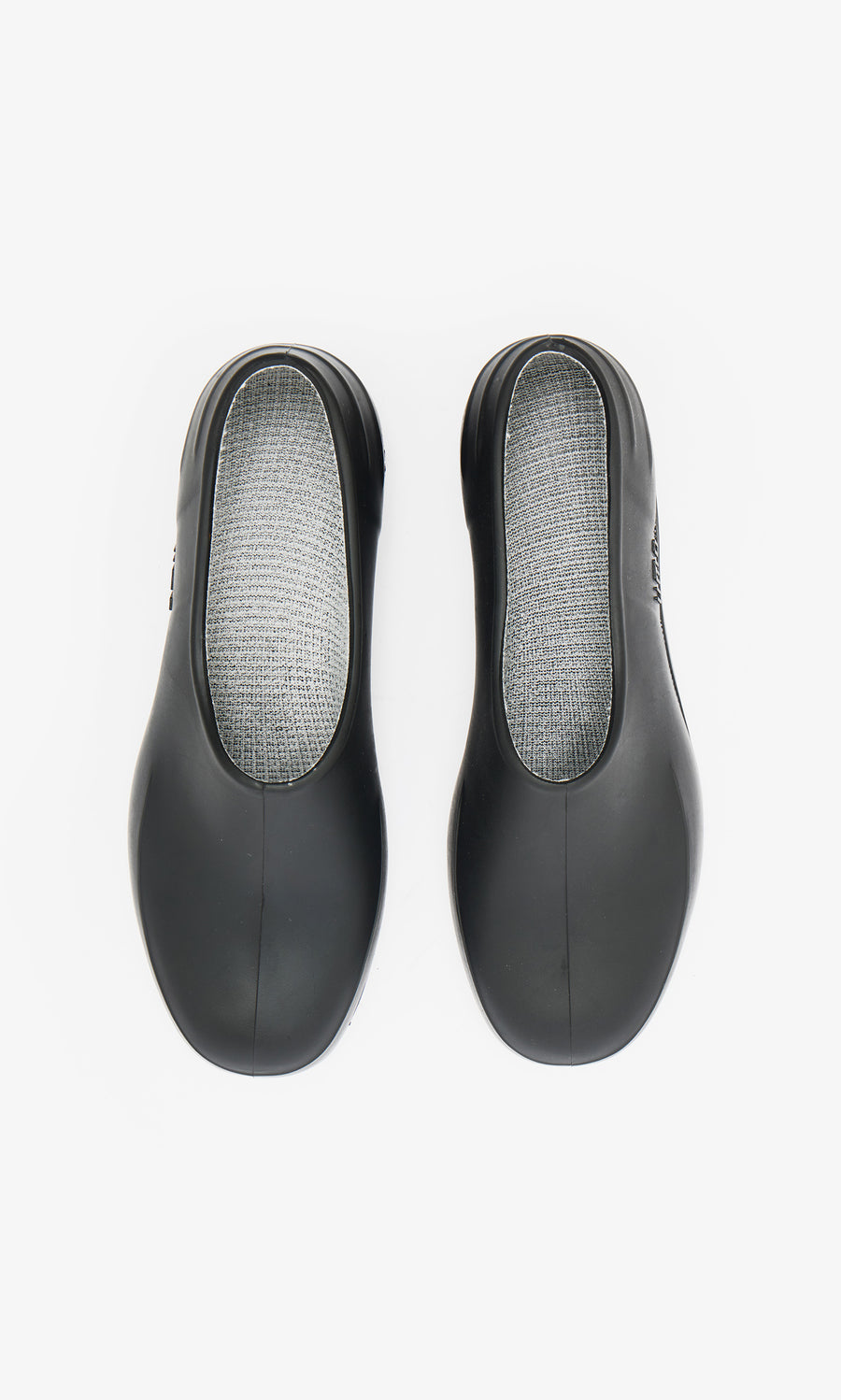 Plümo  Gardenia Clogs - Black with gray textured insoles, viewed from above on a white background.