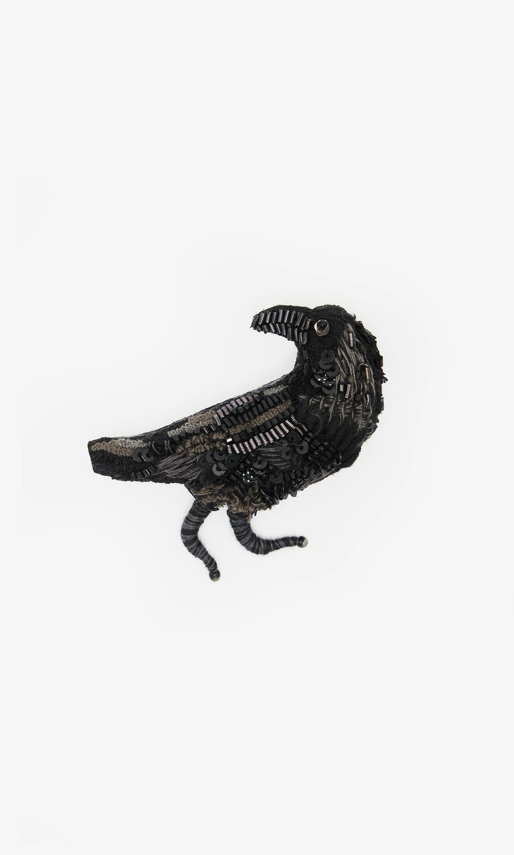Plümo  Black Raven Brooch—handmade with sequins and beads, exquisitely embroidered on a white background.
