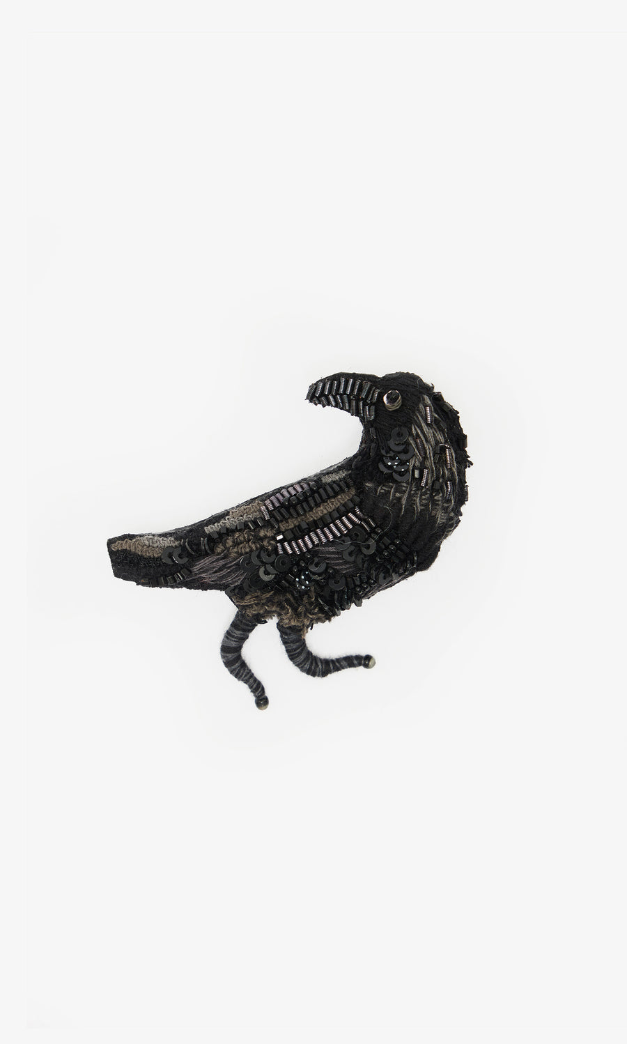 Plümo  Black Raven Brooch—handmade with sequins and beads, exquisitely embroidered on a white background.