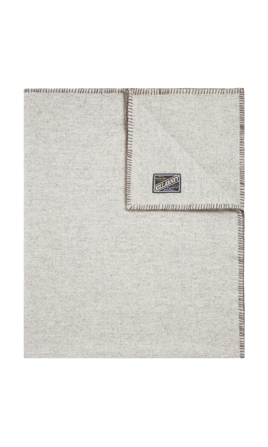 Plümo  Light gray Kilkenny Blanket - Fossil, wool with stitched edges, shown folded to display the Kilkenny label.