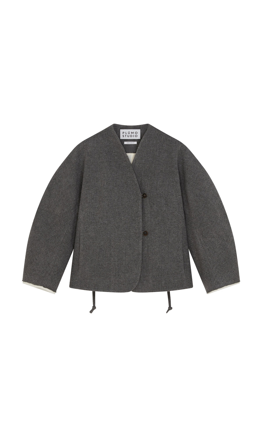 Plümo  Gray Rostock Jacket by Plümo Studio; collarless, wool, wide sleeves, peplum hem. Shown on a white background.