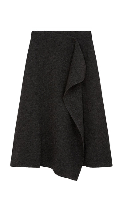 Plümo  Eardley Skirt: Dark gray, midi-length with front ruffle detail, asymmetric hem; shown on white background.