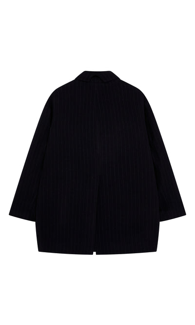 Plümo  Cleo Blazer: black, long-sleeved vintage tailcoat with subtle pinstripes, shown from the back on white background.